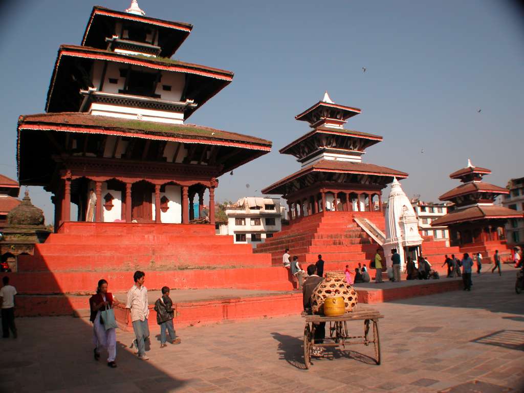 Manaslu 00 12 Kathmandu Durbar Square Trailokya Mohan, Maju Deval and Narayan Temples Kathmandus Durbar Square is a complex of beautiful Hindu temples and shrines built in the 16th and 17th centuries in pagoda style embellished with intricately carved exteriors. Shining in the early morning sun at Kathmandus Durbar Square are Trailokya Mohan, Maju Deval and Narayan Temples. Built in 1690, Trailokya Mohan stands on a five-stage plinth with three roofs and is dedicated to Vishnu. Built in the late 17C, Maju Deval has a nine-step brick base. On the far right is Narayan Temple.